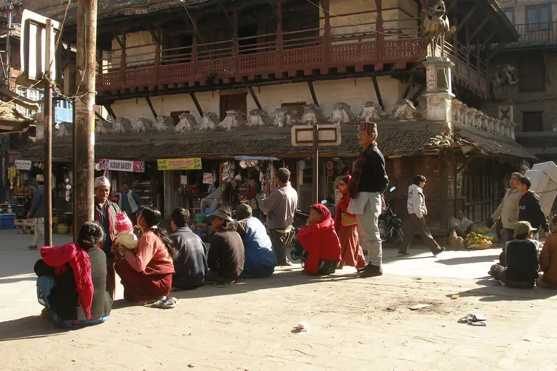 People sitting together in a square in Kathmandu